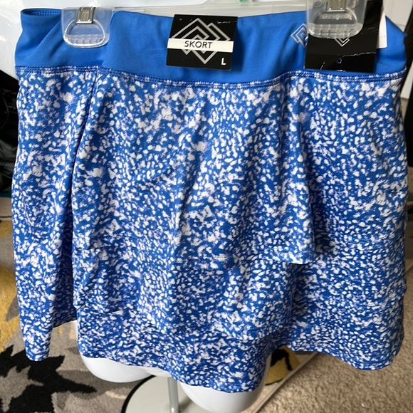 ZELOS Other - Kids Zelos ruffled skort is blue & White size L.